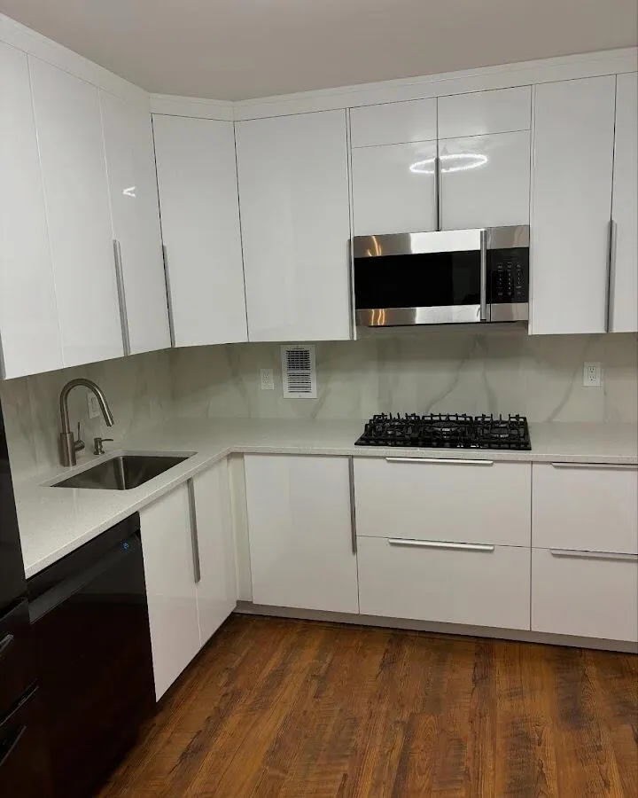 Restored kitchen with white cabinets after water damage in Hudson